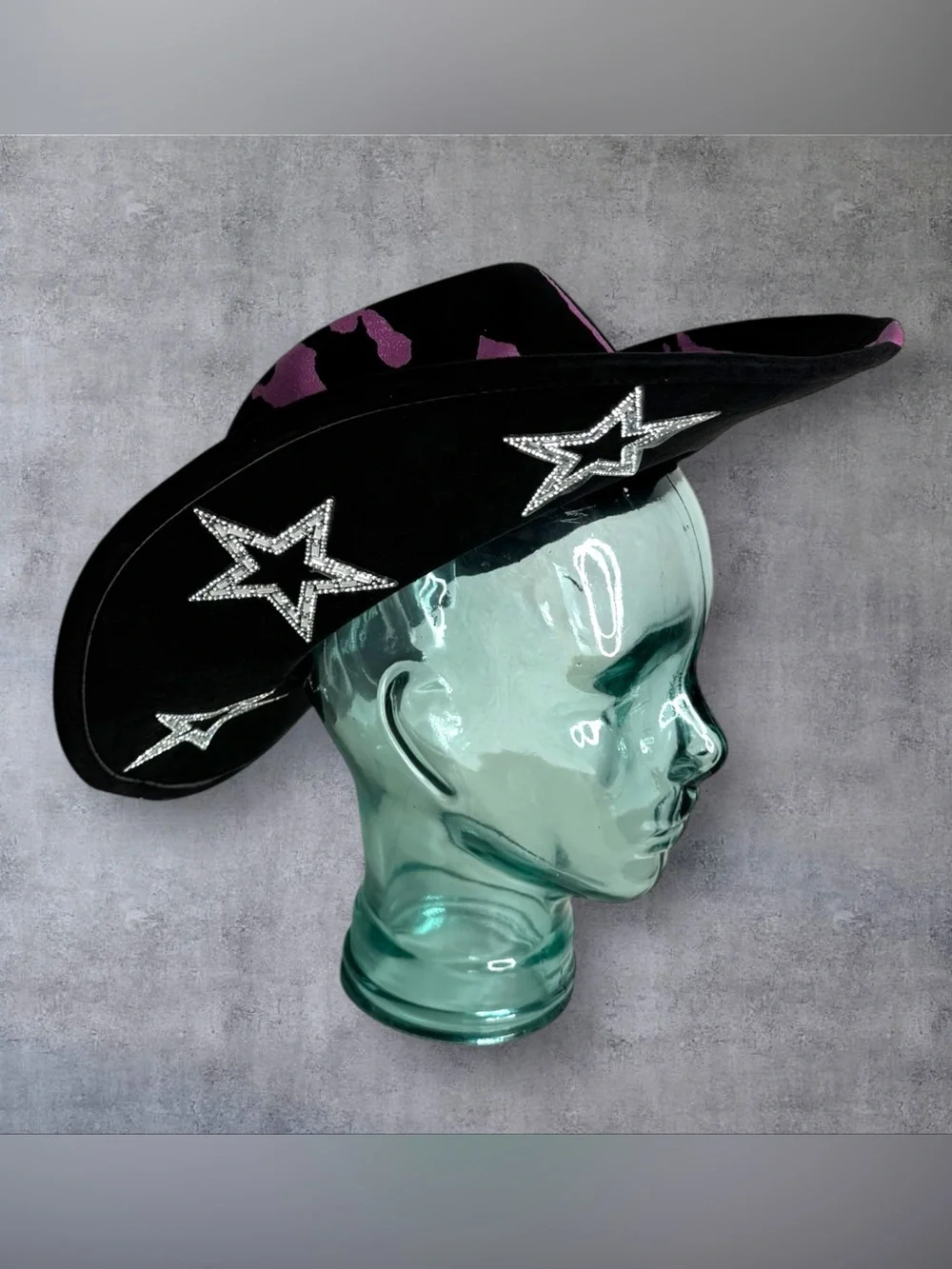 Black Cowboy Hat with Pink Accents and Star Embellishments